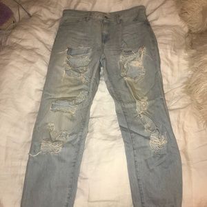 Distressed very ripped jeans